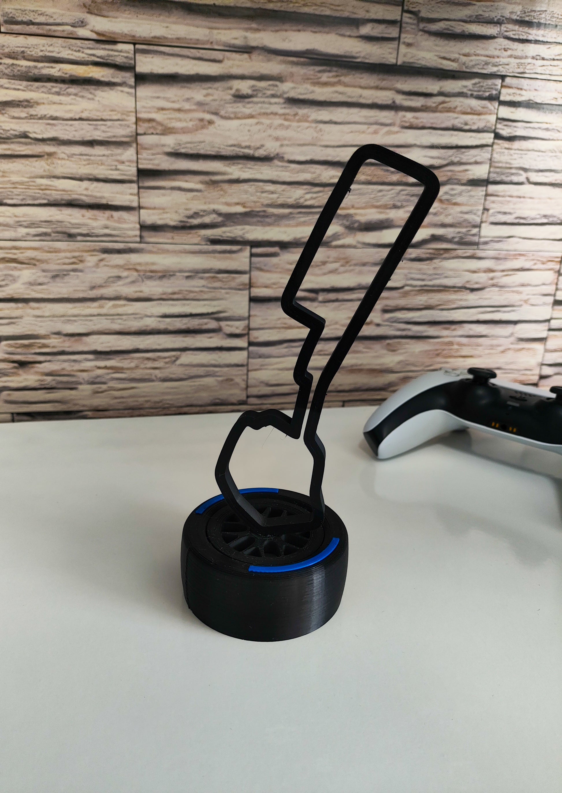 Soporte Stand de Circuitos F1  en neumaticos F1 impresos en 3D- AR3DStudios