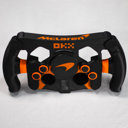 Réplica de volante F1 McLaren negro con acabados de alta calidad para simracing