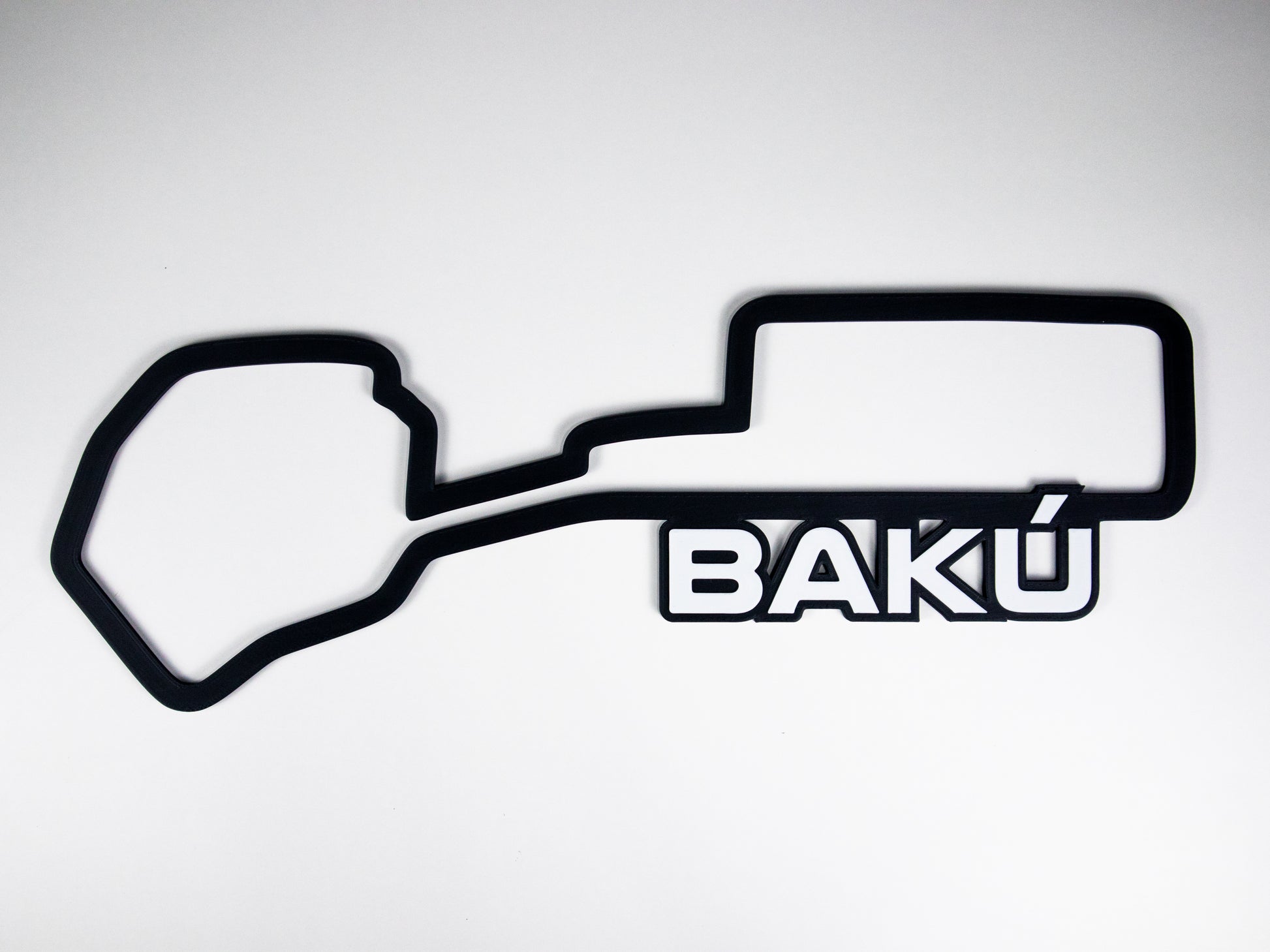 Silueta minimalista del circuito de Baku de Formula 1 sobre fondo blanco para pared