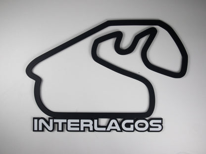 Silueta minimalista del circuito de Interlagos de Formula 1 sobre fondo blanco para pared.