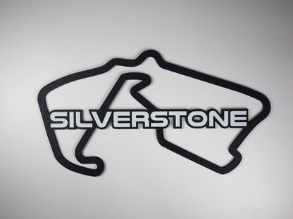 Silueta minimalista del circuito de Silverstone de Formula 1 sobre fondo blanco para pared