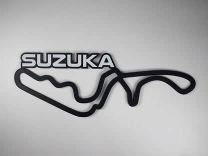 Silueta minimalista del circuito de Suzuka de Formula 1 sobre fondo blanco para pared