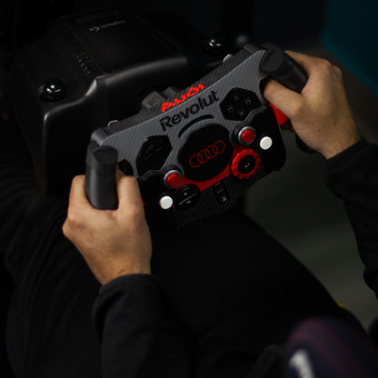 Detalle de empuñaduras ergonómicas premium de mod F1 Audi para simulador